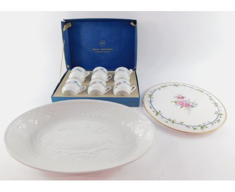 A Royal Worcester porcelain cake stand decorated in the Sheridan pattern, printed mark, 28cm diameter, a white glazed Gourmet