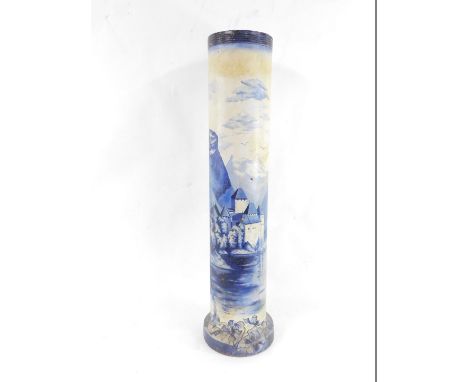 A Continental terracotta drain pipe, painted in blue and white with Chillon Castle, Lake Geneva, 105cm high.