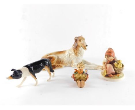 A Royal Dux porcelain figure of a Saluki dog, modelled in recumbent pose, printed mark, together with a Beswick figure of a B