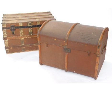 An early 20thC canvas cabin trunk, plywood and metal bound, with double leather strap handles, bears luggage labels, 49cm hig