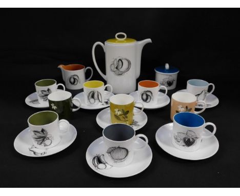 A Susie Cooper part coffee service decorated in the Black Fruit pattern, comprising coffee pot, cream jug and sucrier, seven 