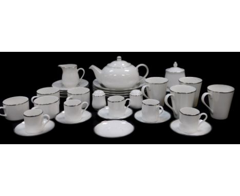 A Maxwell Williams porcelain part breakfast service, decorated in the White Platinum pattern, comprising teapot, cream jug, s