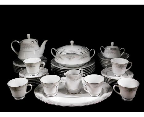 A Noritake porcelain part dinner and tea service decorated in the Sweet Leilani pattern, Legendary Series, comprising oval me