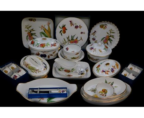 A group of Royal Worcester oven to tableware decorated in the Evesham pattern, including vegetable dishes, tureens and covers