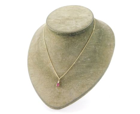 A 9ct gold ruby and diamond pendant on chain, 2.0g.