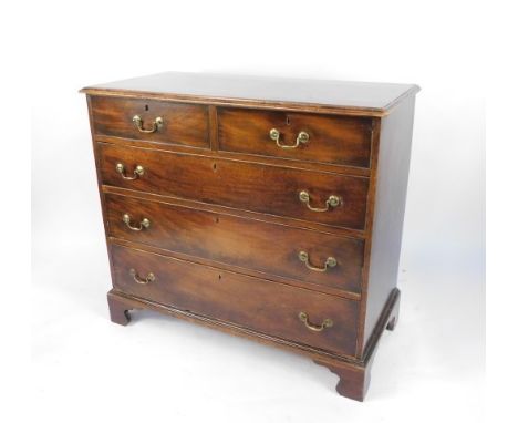 A George III mahogany chest, of two short over three long graduated drawers, raised on bracket feet, 98cm high, 110cm wide, 5