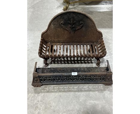 A 19th Century cast iron fire grate and fender.