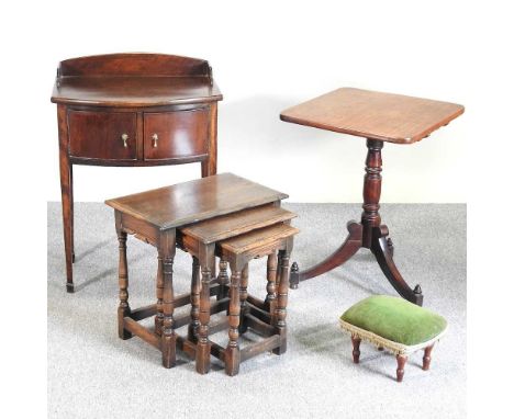 A Victorian mahogany occasional table, on a tripod base, 52cm wide, together with an early 20th century cabinet, nest of thre