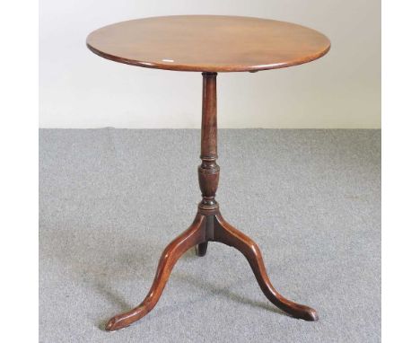 A George III mahogany tilt top occasional table, on a tripod base60w x 73h cm