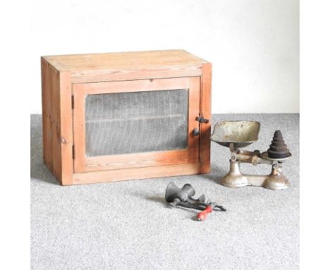 An antique pine meat safe, with a mesh door, together with a set of vintage kitchen scales and a meat grinder62w x 37d x 46h 