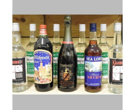 A collection of bottles of spirits, to include Coronation commemorative sparkling wine, gin, rum and vodka