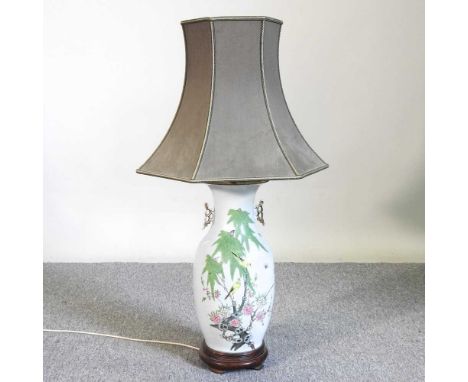 A Chinese porcelain table lamp and shade, 87cm highDirty with wear to gilt, but appears to be undamaged. Shade is marked. Has