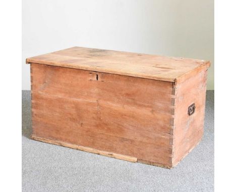 An antique pine trunk, with a hinged lid100w x 55d x 54h cmUsable, but quite heavily worn and marked. Some mouldings missing.
