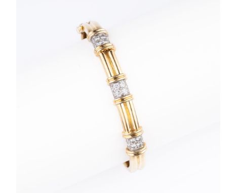 Tiffany &amp; Co. Brillant-Armreif 'Bangle Diamonds'. Um 1980-85. 18 kt. GG, gest., mit Platin, MZ: Tiffany &amp; Co. Schause