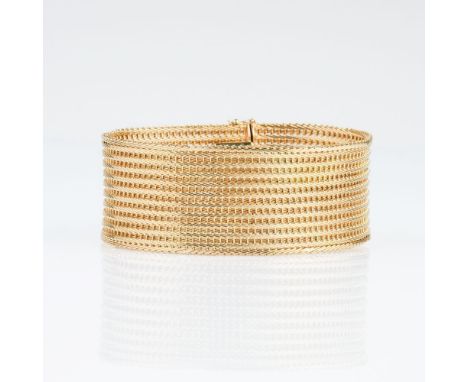 Vintage Gold-Armband. 1960/70. 18 kt. GG, gest. Gestiftete Flechtoptik. B. 28 mm, L. 19,5 cm, Gew. ca. 45,6 g.  - 