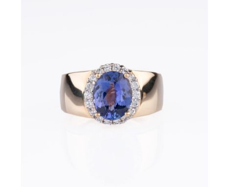 Tansanit-Brillant-Ring. 14 kt. GG, gest., MZ: IV. Der ovalgeschliffene Tansanit 3,45 ct. (11 x 9 mm) mit 18 Brill. zus. ca. 0