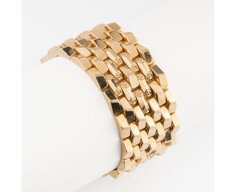 Breites Vintage Gold-Armband. 1960/70. 18 kt. GG, gest. Backstein-Variation in Dreiecksform, tlw. mit Blüten-Relief. Kastensc