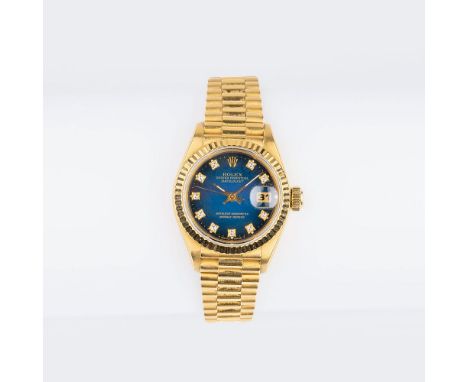 Rolex. Damen-Armbanduhr 'Lady Datejust' mit Diamanten. 1993/94. 18 kt. GG, Faltschließe gest., Automatik, Ref.Nr. 69178, Seri