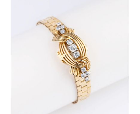 Universal Genève. Vintage Damen-Schmuckuhr mit Brillant-Besatz von Knoll &amp; Pregizer. Um 1960. 18 kt. GG mit WG, gest., MZ
