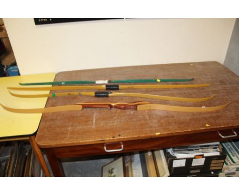 A SELECTION OF VINTAGE ARCHERY  LONG BOWS