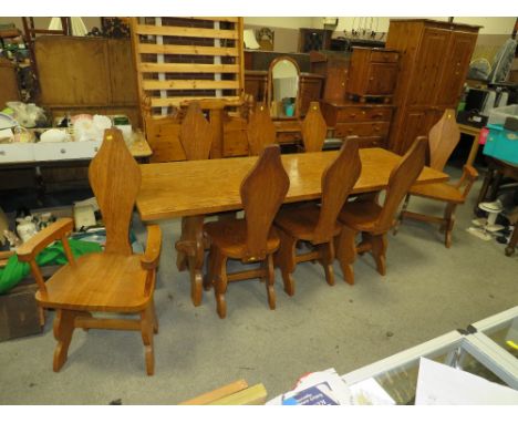 AN ARTS AND CRAFTS STYLE LIGHT OAK REFECTORY TABLE AND EIGHT CHAIRS - TABLE H 74 CM, L 212 CM