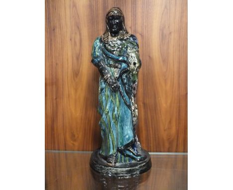 A VINTAGE CERAMIC FIGURE OF AN EGYPTIAN STYLE MAN, SIGNED A.B. HEATON TO BASE, H 36 CM, CHIP TO BASE EDGE