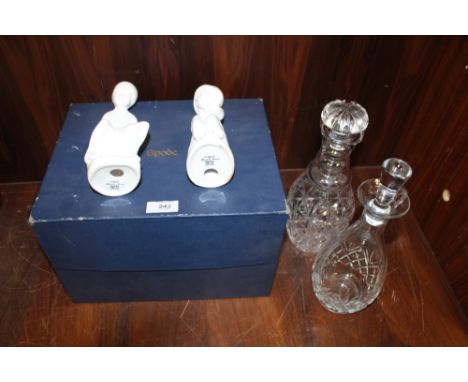 TWO CUT GLASS DECANTERS TOGETHER WITH A BOXED PAIR OF SPODE SIMON AND JOANNA FIGURES