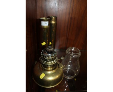 A PAIR OF BRASS TRENCH ART VASES TOGETHER WITH A FRENCH BRASS OIL LAMP