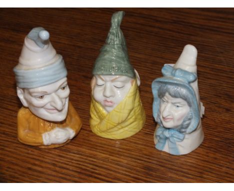 THREE ROYAL WORCESTER CANDLE SNUFFERS ENTITLED MR CAUDLE, MRS CAUDLE AND PUNCH