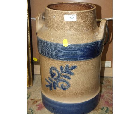 A DECORATIVE CERAMIC CHURN 