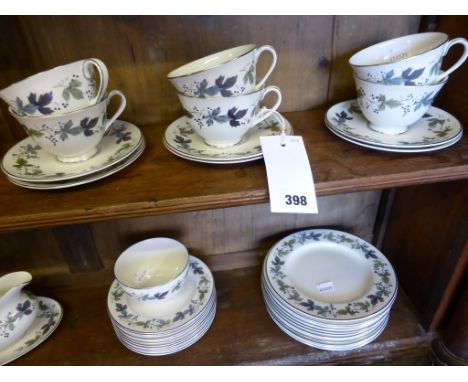 A twelve place complete Royal Doulton 'Burgandy' dinner service together with tea and coffee set (109)