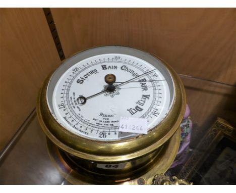 A brass ships barometer.