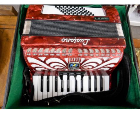 A Luciano 48 bass piano accordion. With case.
