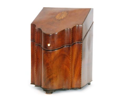 A 19th Century mahogany serpentine knife box with inlaid detail, opening to later compartmental interior, height 35cm, all ra