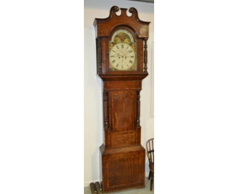 A 19th Century mahogany cross-banded longcase clock with an eight day movement striking on a bell, the case with swan neck pe