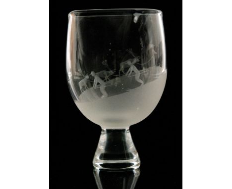 A post war Orrefors glass Skiers and Reindeer vase designed by Sven Palmqvist, of ovoid form raised on a conical foot, engrav