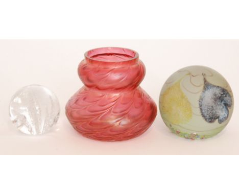 A later 20th Century Caithness limited edition Orchids glass paperweight decorated with stylised lily pads and trailing above