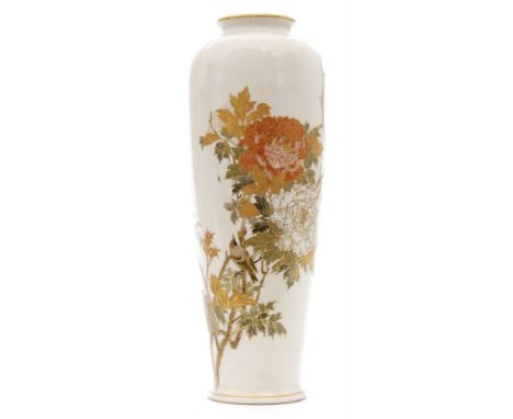 A late 19th Century Japanese Satsuma vase of slender baluster form decorated with a spray of enamel and gilt flowers and foli