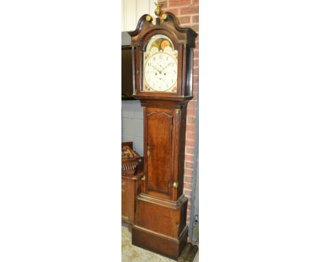 A 19th Century oak and mahogany longcase clock by Webster Shrewsbury with arch painted moonphase dial incorporating seconds a