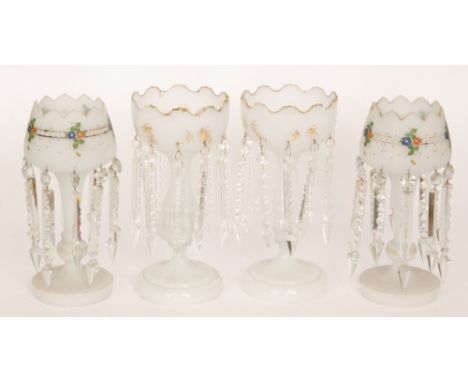 A pair of late 19th Century Continental glass table lustres, the domed foot rising to an inverted baluster stem and cup form 