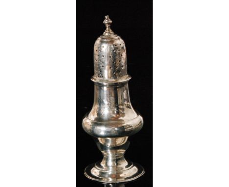 A George III hallmarked silver caster of baluster form with engraved lion crest pierced pull off cover and urn shaped finial,