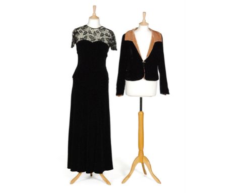 A 1930s ladies vintage full length evening dress, the black velvet body with peplum to the waist and an inset V panel to the 