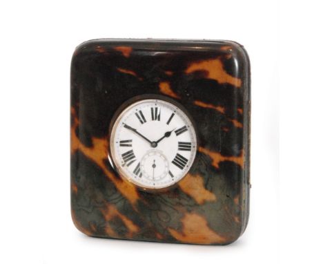 An early 20th Century tortoiseshell bedside clock case with lever fob watch