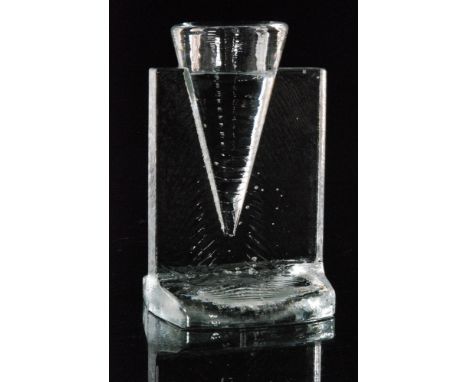 A contemporary Kosta Boda glass Ice Age candlestick designed by Kjell Engman, the inverted T form base surrounding a conical 
