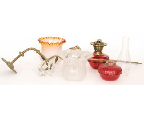 A Victorian drop lustre oil lamp and shade with ruby reservoir and a similar suspended ceiling oil lamp with crimped shade, i