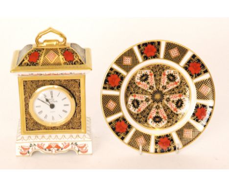 A boxed Royal Crown Derby Old Imari 1128 pattern mantel clock, printed mark, height 19cm together with a matching side plate,