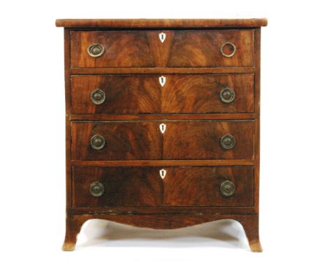 A 19th Century mahogany chest of four drawers of small proportions, with a crossbanded top and French bracket feet, height 79