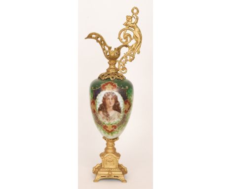 A large late 19th Century Art Nouveau pedestal ewer, the egg shaped body decorated with a transfer portrait of a long haired 