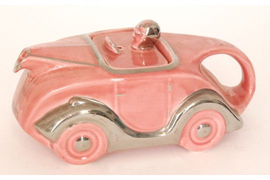 A 1930s Sadler Teapot Modelled As A Pink Racing Car With Silver Lustre Trims Detailing And Okt42