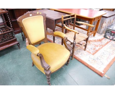 Victorian mustard upholstered mahogany armchair, together with an oak rush seated carver with bobbin turned back rest